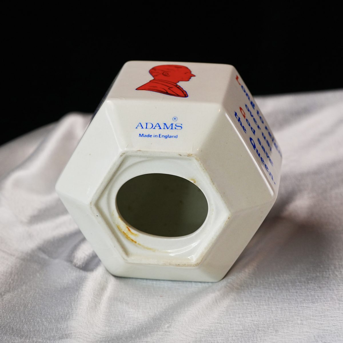 Maker's mark on the base of Vintage Adams QEII Silver Jubilee Money Box