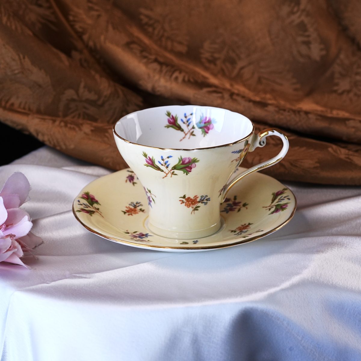 A gilded vintage teacup from the Rabbit Hole collection